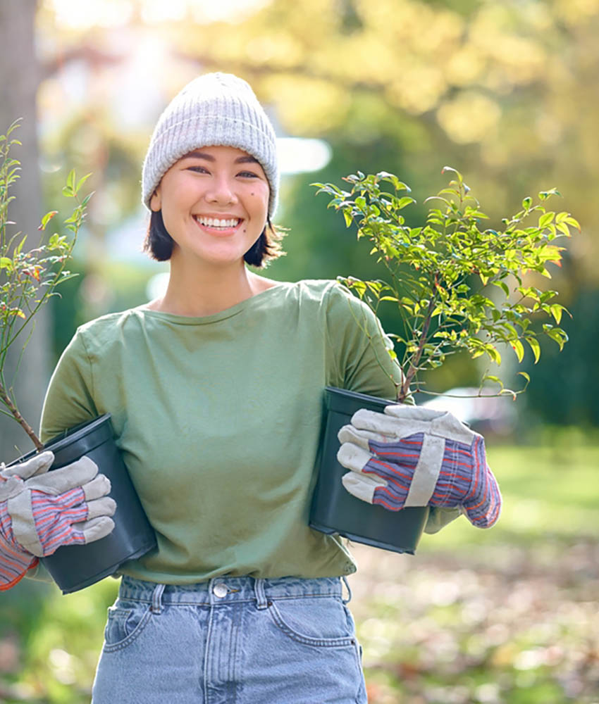 Woman,Portrait,,Plant,And,Gardening,In,A,Park,With,Trees